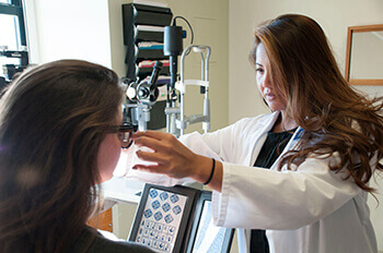 Woman receiving an Eye Exam
