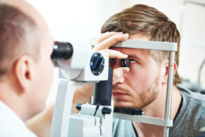 eye doctor performing eye exam for lasik